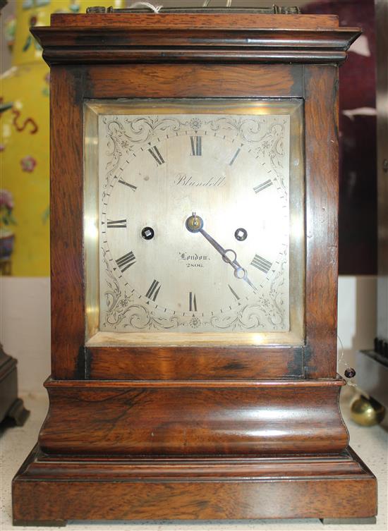 Blundell of London. An early Victorian rosewood hour repeating mantel clock, 10in.